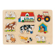 A wooden farm-themed puzzle board with multiple illustrated pieces including a barn, tractor, goose, horse, cow, sheep, cat, dog, and goat, shown on a plain white background.