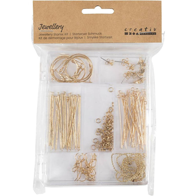 Jewelry starter kit with gold jewelry components in clear packaging on a white background