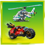 Toy helicopter and vehicle on a green background