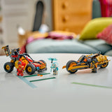 Toy vehicles and figures on a table with a blurred indoor background
