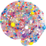 Colorful slime with multicolored beads on a white background