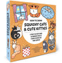 A boxed craft guide titled "How to Draw Squishy Cats & Cute Kitties" shown at a slight angle. The box is predominantly orange with a large white oval center and colorful cartoon cat illustrations around the text.
