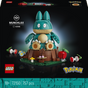 LEGO Pokémon Munchlax building set box art showing the assembled Munchlax figure centered on a dark background, with LEGO and Pokémon logos and product text visible.