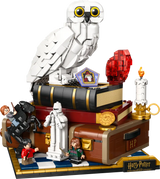 LEGO Harry Potter set with owl, books, and characters on a white background