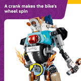Toy bike model with mechanical components and flames, educational text about cranks and wheels.
