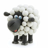 Sheep figurine made of white and black balloons on a white background