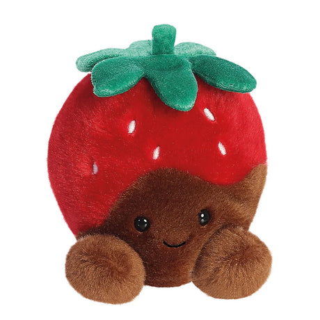 Plush toy shaped like a strawberry with a smiling face on a white background