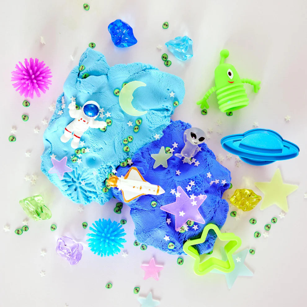 Blue slime with space-themed decorations on a white background