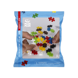 Package of Plus-Plus building set with colorful puzzle pieces on a white background