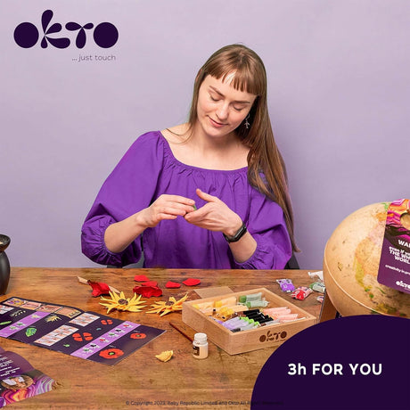 Woman in purple shirt interacting with a product on a table with 'Okto' branding.