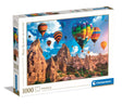 Puzzle box with colorful hot air balloons and rock formations on the cover, featuring the Clementoni brand.
