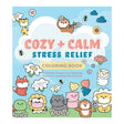 Coloring book titled 'Cozy + Calm Stress Relief' with cartoon animals and flowers on a blue background.