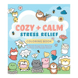 Coloring book titled 'Cozy + Calm Stress Relief' with cartoon animals and flowers on a blue background.