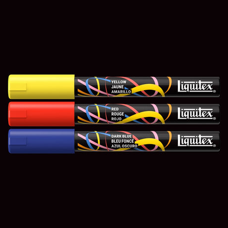 Three markers in yellow, red, and dark blue with 'Liquitex' branding on a black background.