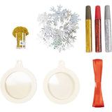 Decorative items including snowflakes, glitter, ribbons, and ornaments on a white background