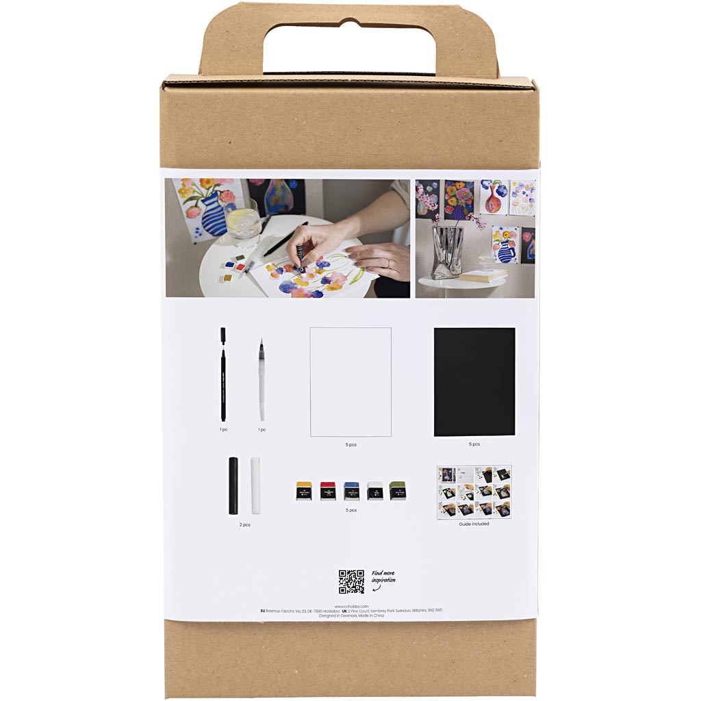 Cardboard box packaging for an art set with images of art supplies on a white background