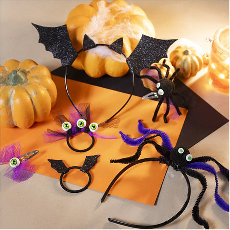 Halloween-themed headbands with spider and bat designs on a pumpkin background