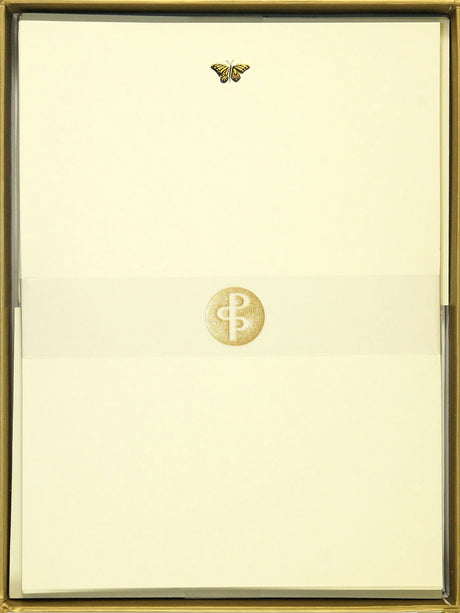 Gold-framed document with a logo on a beige background