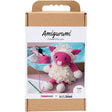 Amigurumi kit packaging with a small crocheted sheep and yarn on a white background