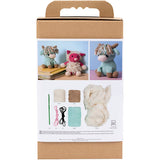 Knitting kit packaging with yarn, needles, and crochet patterns on a white background