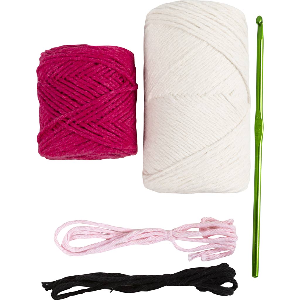 Two balls of yarn, a crochet hook, and a piece of string on a white background