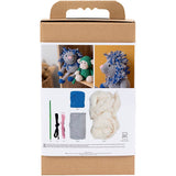 Knitting kit packaging with yarn and tools on a white background