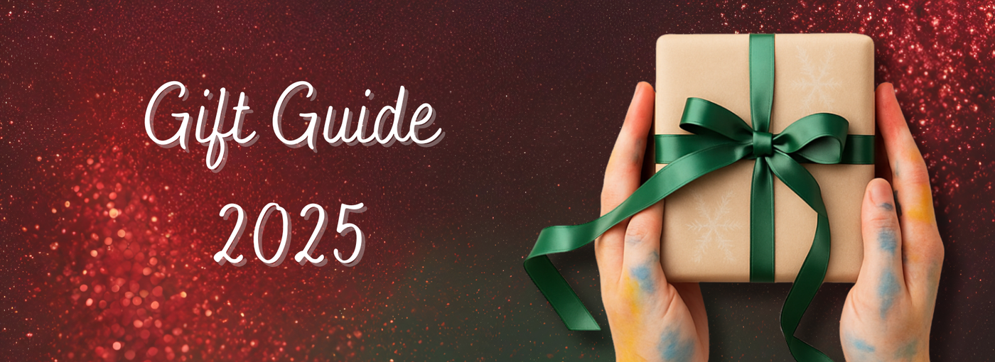 Gift guide 2025 banner with hands holding a wrapped gift on a dark background