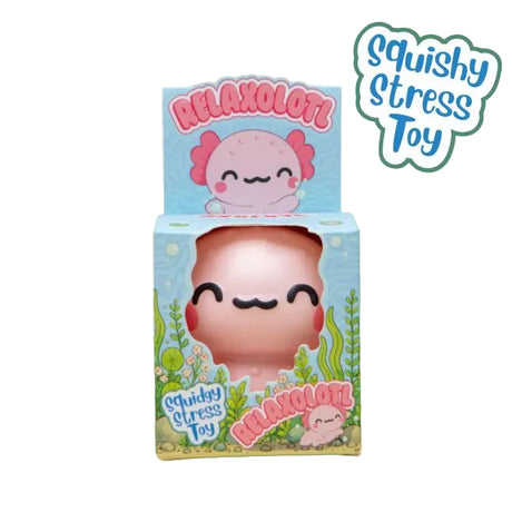 A pink squishy stress toy shaped like an axolotl, shown inside its illustrated retail box on a light green background. The packaging features cartoon axolotl artwork and the words 'RELAXOLOT' and 'squishy stress toy.