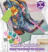 Canvas with a diamond painting of a boot, tools, and text on a white background