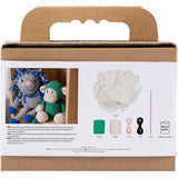 Knitting kit packaging with yarn and tools on a white background