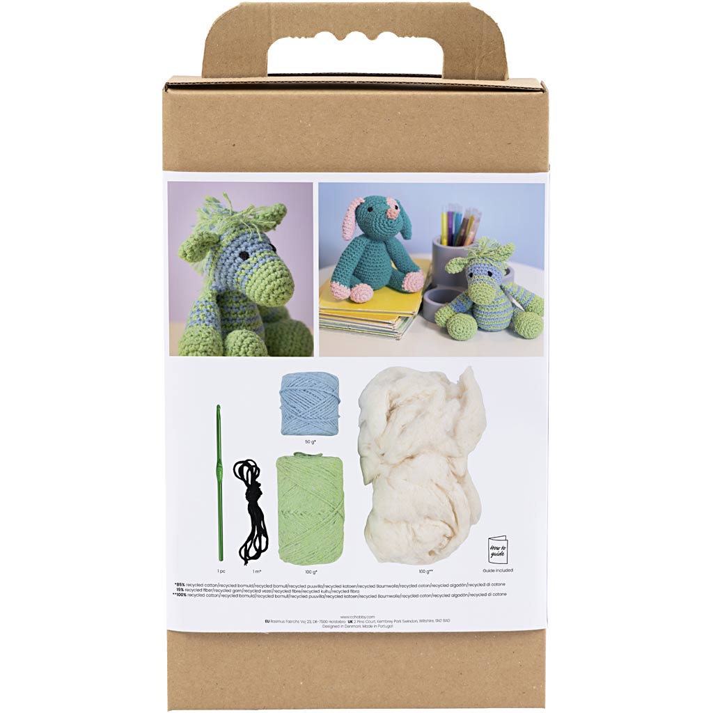 Crochet kit packaging with yarn, hooks, and instructions on a white background