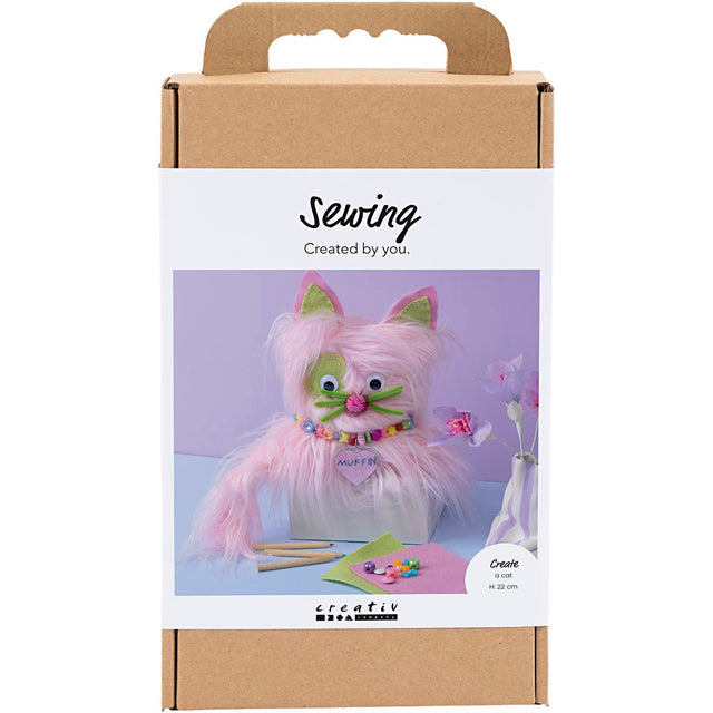 Sewing kit packaging with a cat-themed craft item on a white background
