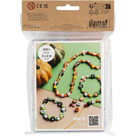 Packaged Halloween-themed beaded necklace with instructions on a white background