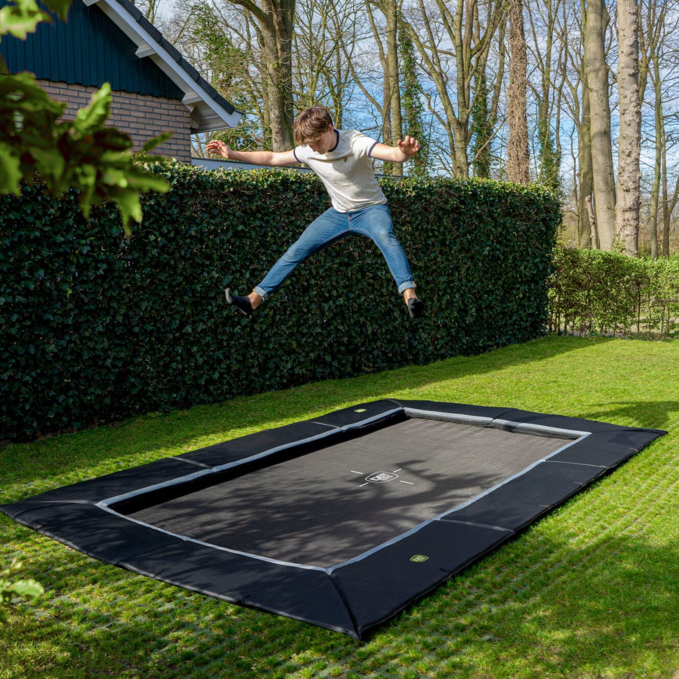 EXIT Dynamic GroundLevel Rectangular Trampoline in the garden