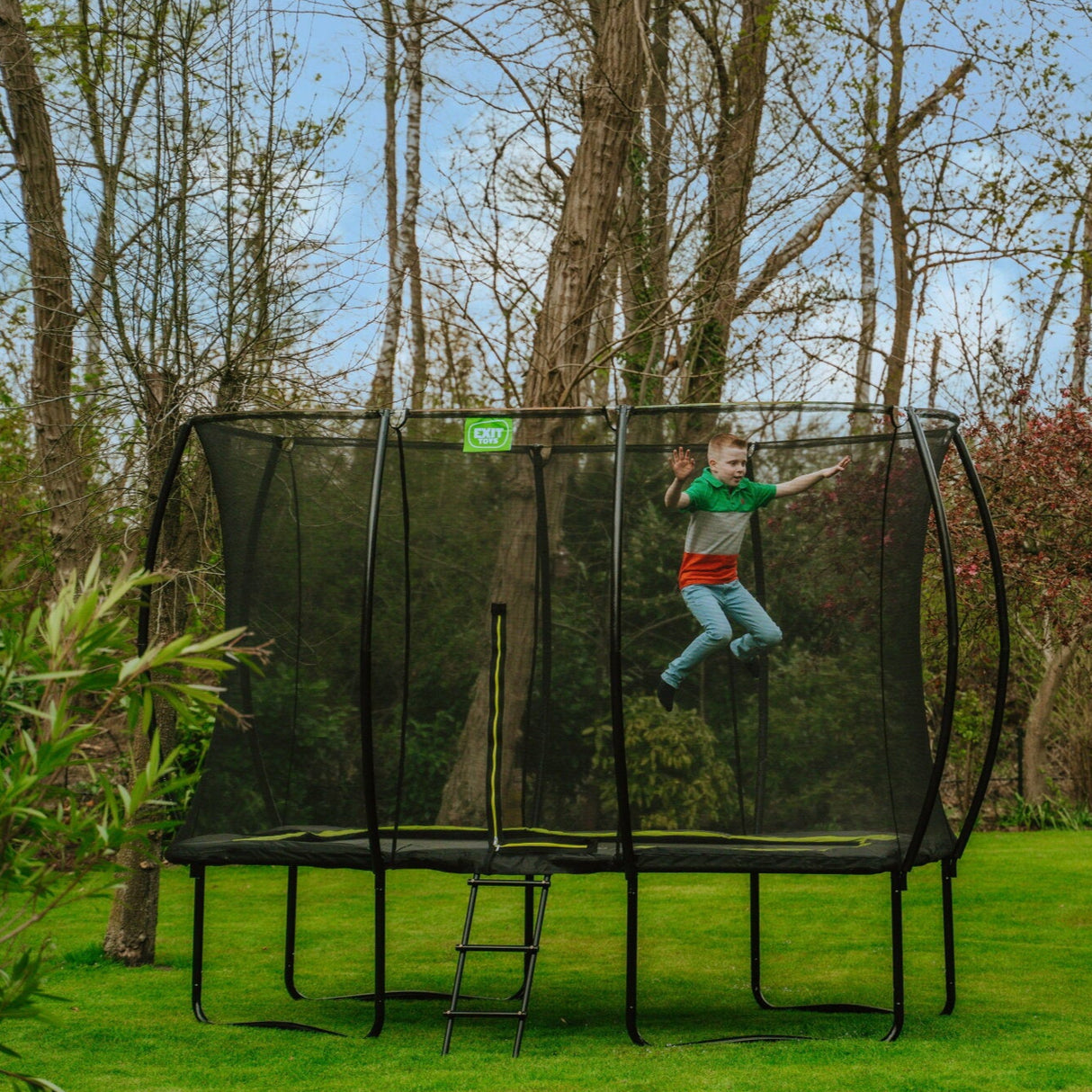 EXIT Silhouette Rectangular Trampoline with Safety Net  in the garden