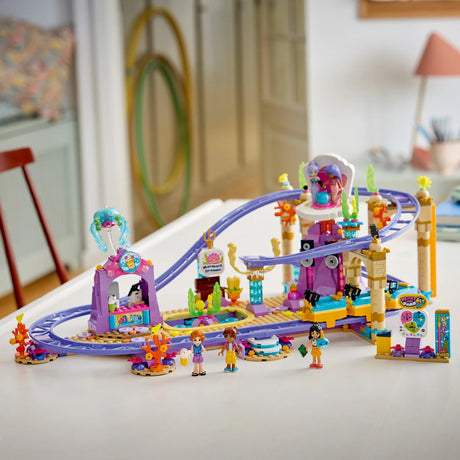 Toy rollercoaster set with figures on a table