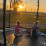 Exit Allure Classic Rectangular Trampoline with Safety Net in the garden