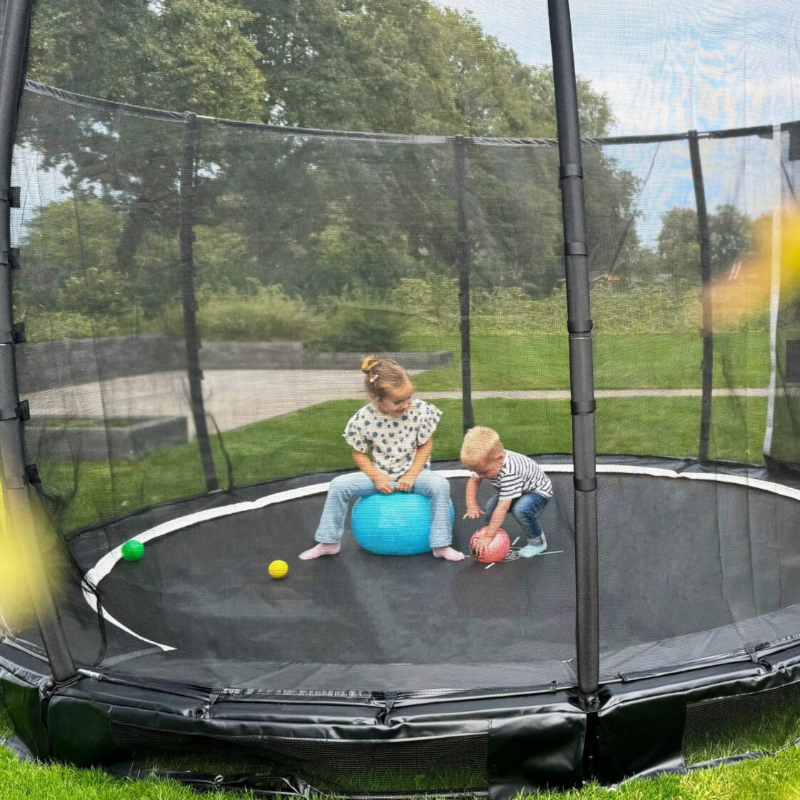 Exit Allure Premium Ground Round Trampoline 10 Ft in the garden