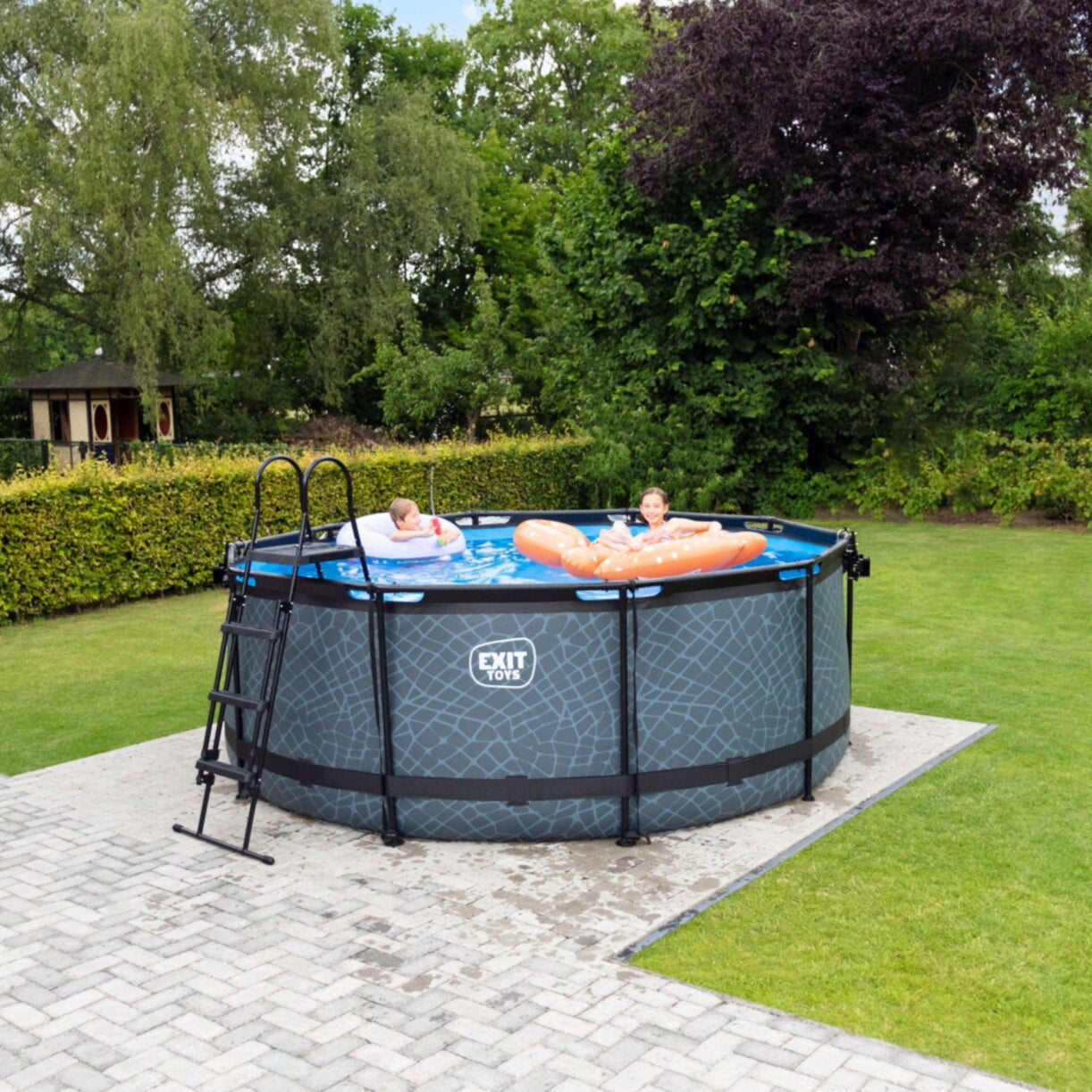 Exit Round Frame Pool Smaller Version in the garden