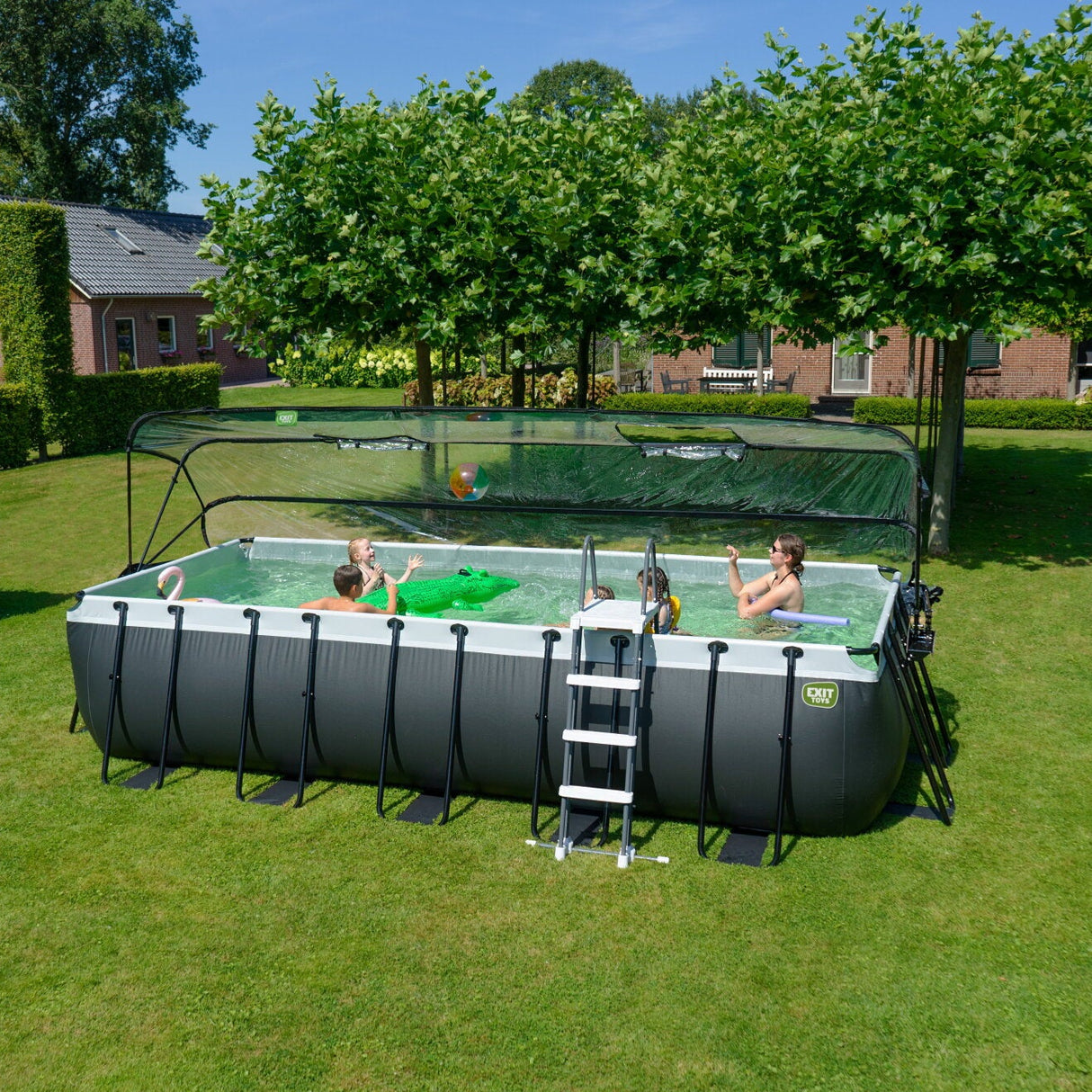 People playing in an outdoors Exit Toys black leather frame pool 