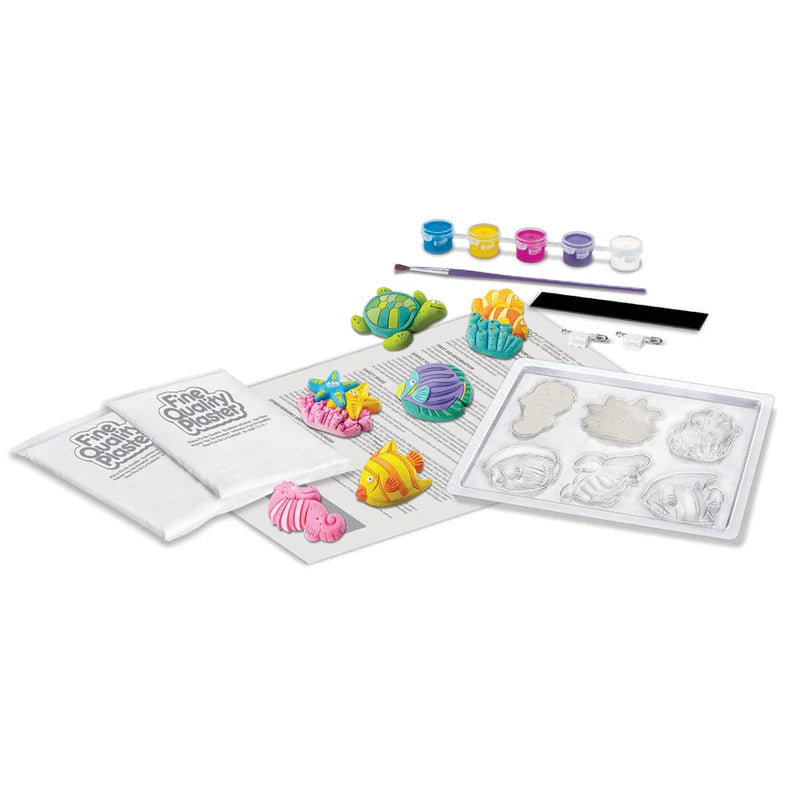 Children's craft kit with moldable clay, tools, and coloring supplies on a white background