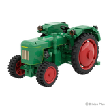Toy tractor model on a white background