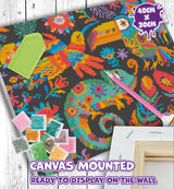Colorful diamond painting canvas with tools on a wooden surface