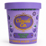 A purple container of Cloudi Co. Giggling Grape Cloud Putty, featuring a matching purple lid and a label decorated with cute smiling grape illustrations and gold and green text.