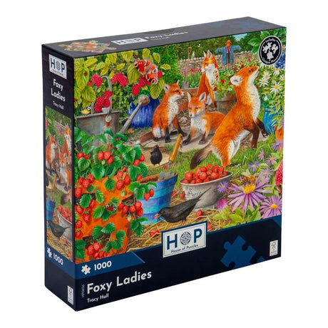 Jigsaw puzzle box featuring foxes in a garden scene with 'Foxy Ladies' text and HOP logo.