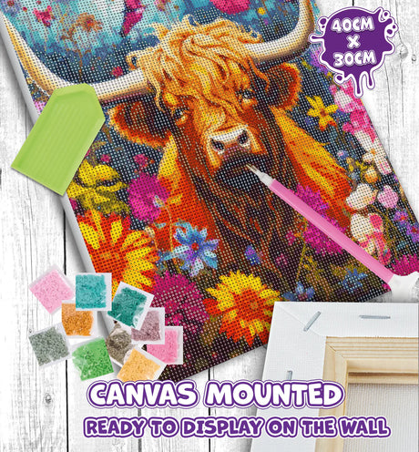 Canvas with a colorful cow design, surrounded by diamond painting tools and materials.