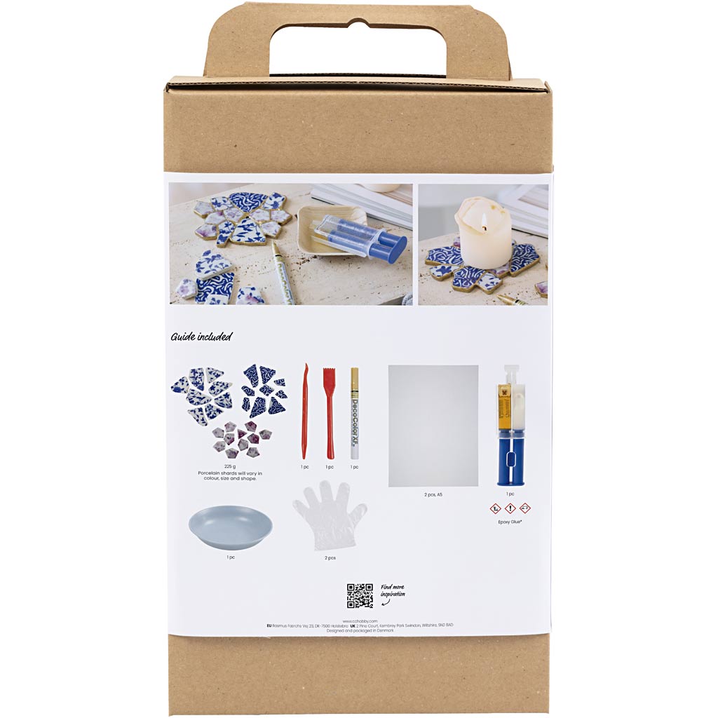 Cardboard box with images of a ceramic art kit on a white background