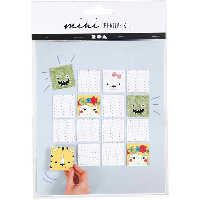 Mini creative kit packaging with colorful animal-themed cards on a white background