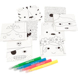 Coloring sheets with face designs and markers on a white background
