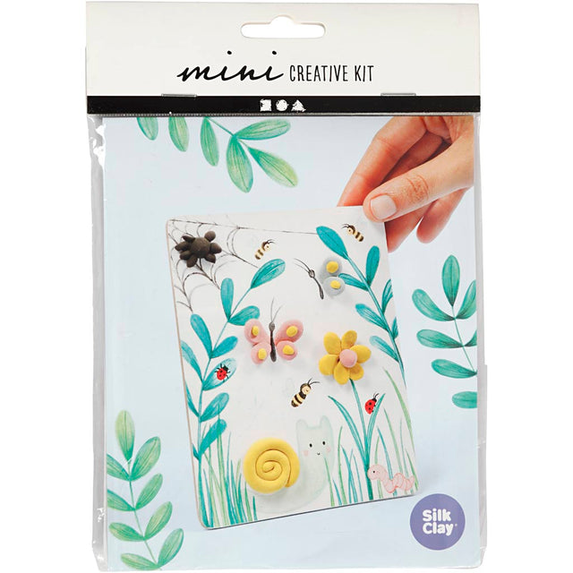 Silk Clay mini creative kit packaging with hand holding a piece of clay art.